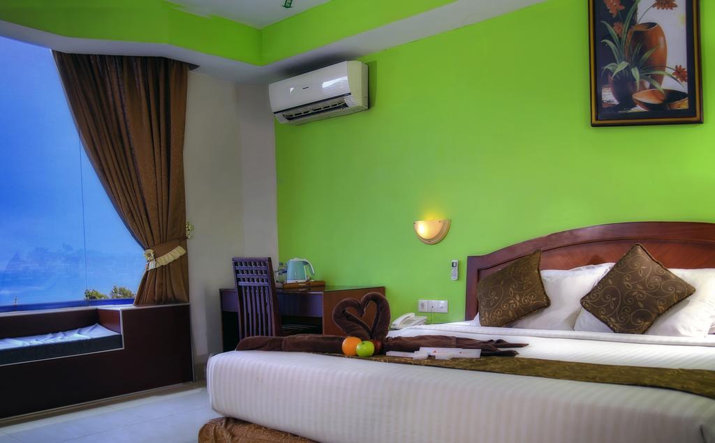Grand Hotel Jambi Værelse billede